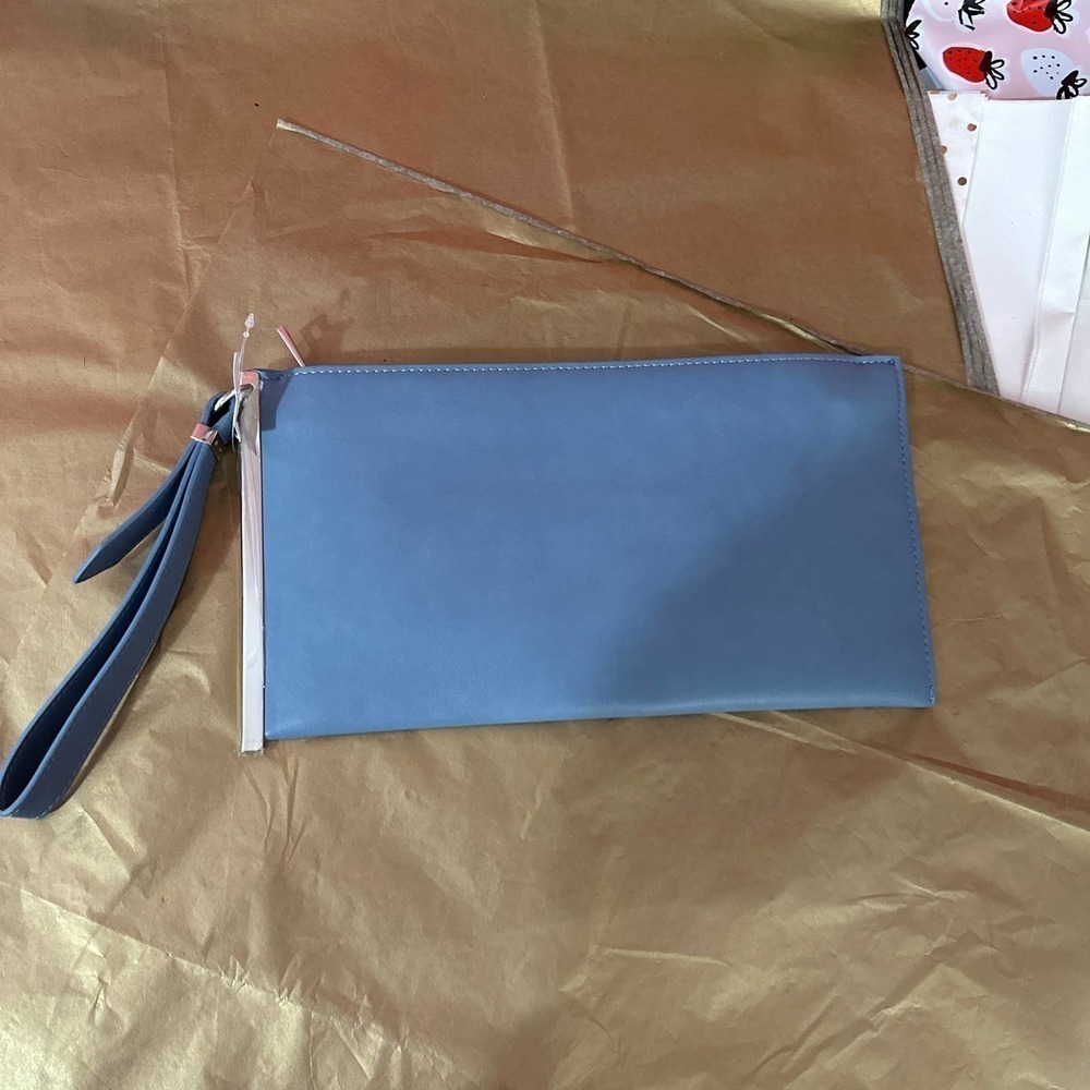 C established 1946 clutch purse